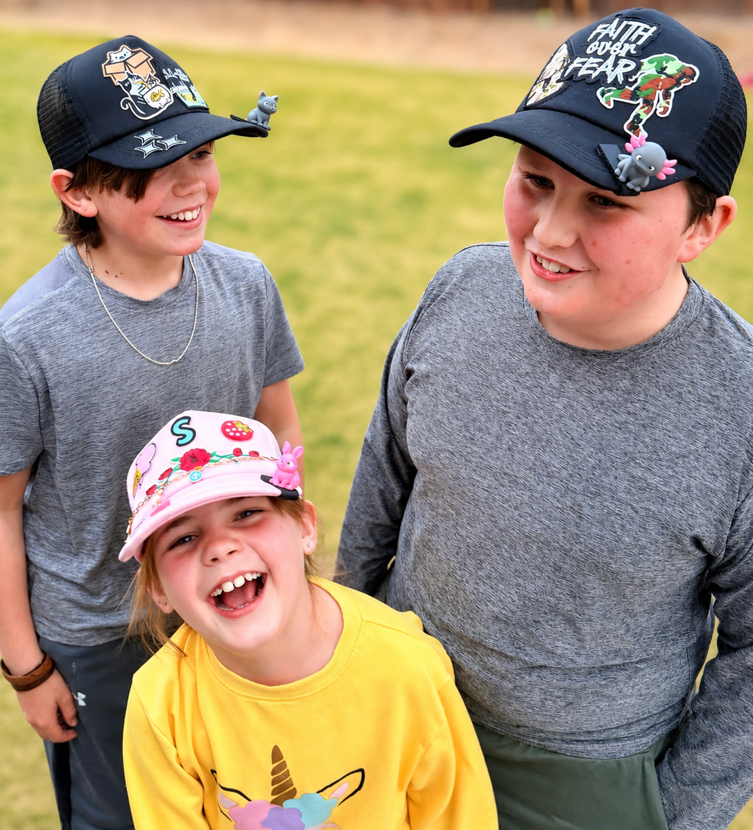 3 kids wearing custom hats and BrimPets