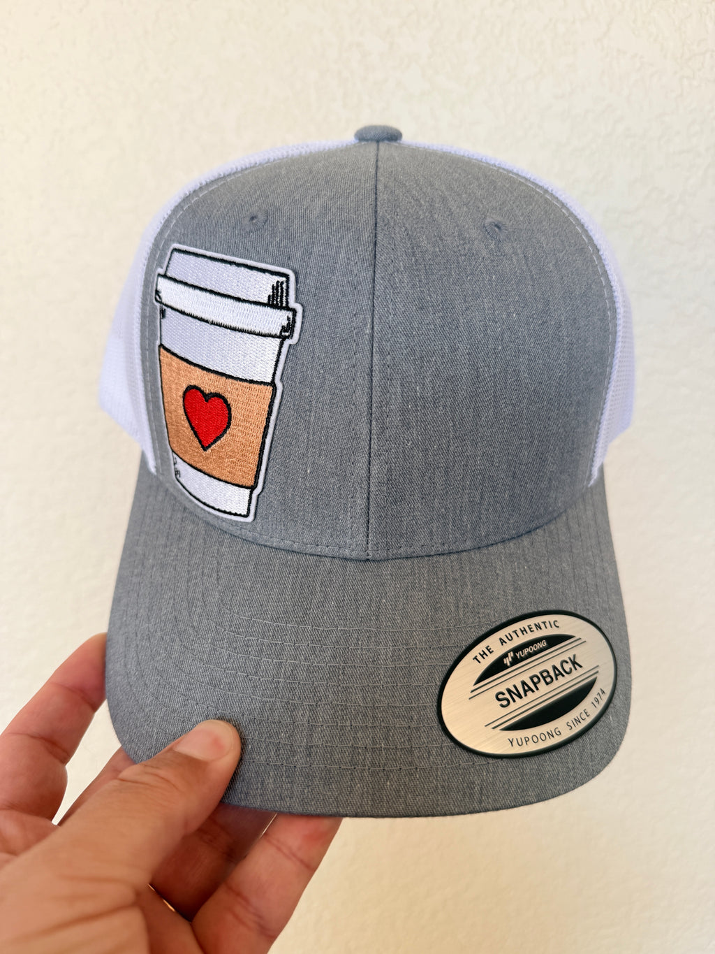 Grey structured trucker hat with embroidered coffee cup heart patch – custom womens hat – Hedrick Hat Co