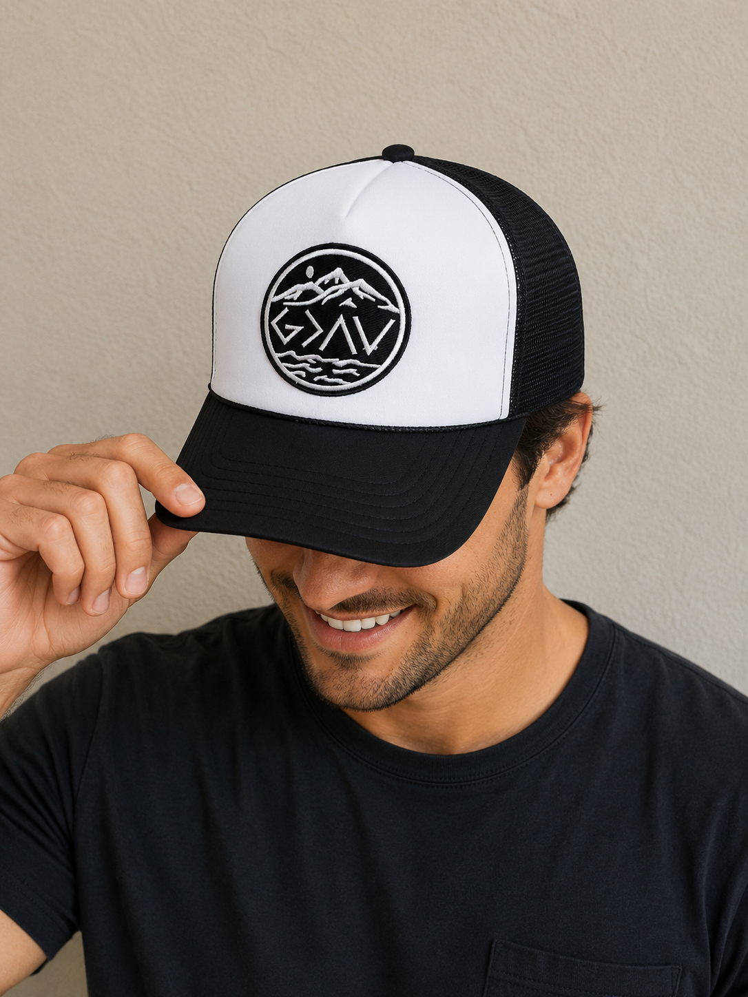 God is Greater black and white Trucker Hat